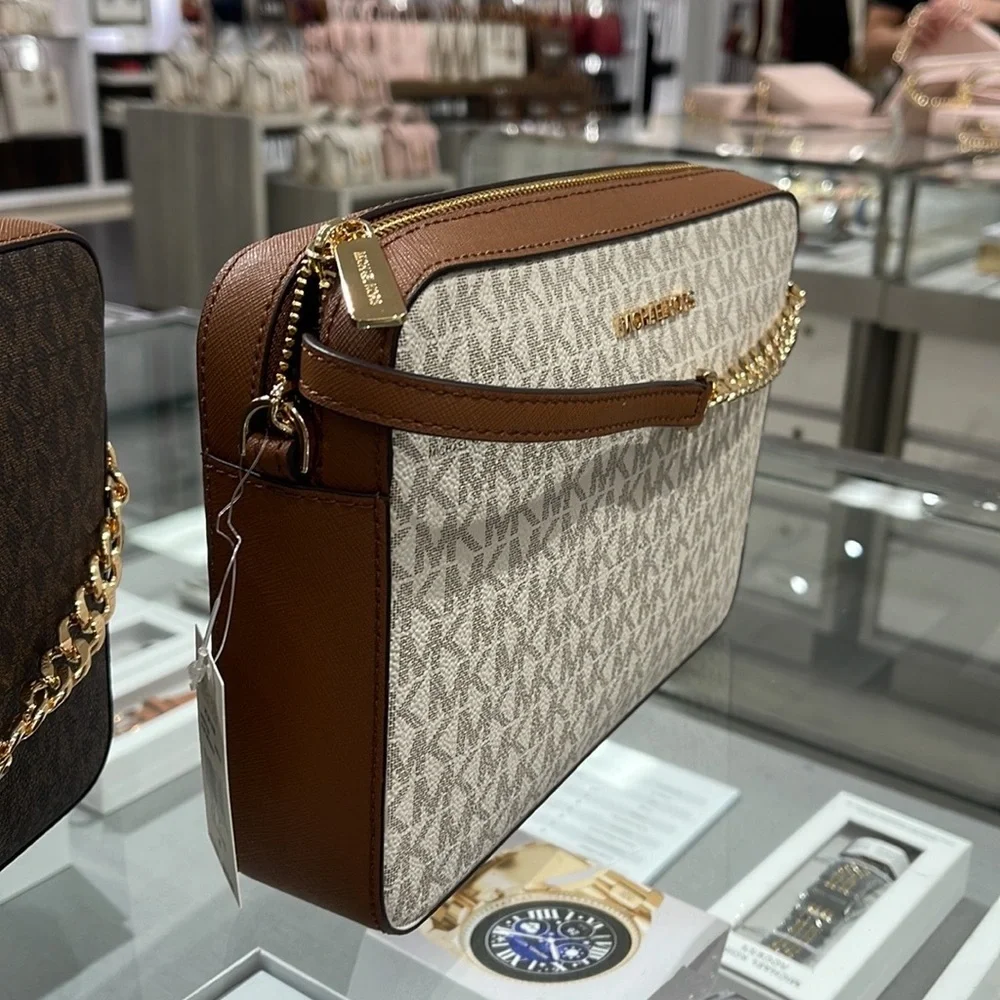 Michael Kors Jet Set Item Large East West Zip Crossbody Vanilla Signature
EW - Picture 16 of 16